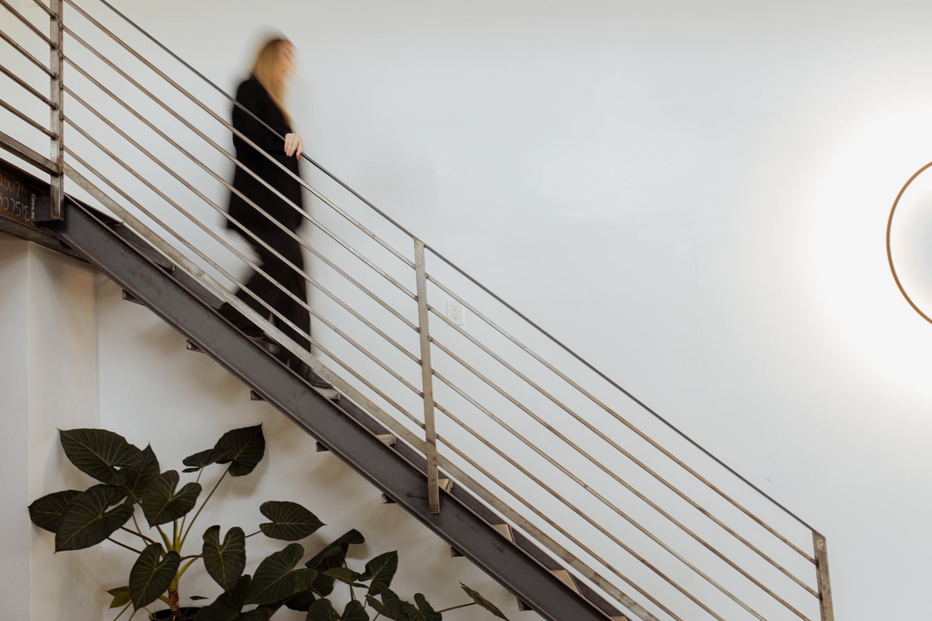 Employee Going Down the Stairs 