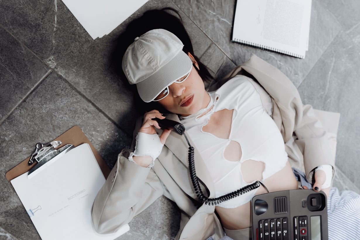 Minimal Fashion Office Woman on Call Laying on the Floor